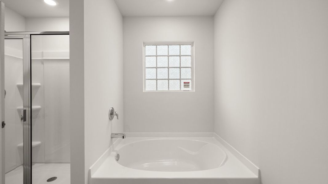 Representative furnished interior of a home built from the Robie by D.R. Horton in Lost Creek, Dallas (Image 14).