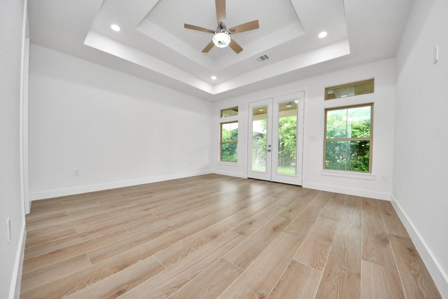 Primary Bedroom, Access to back patio. Primary Bedroom, Access to back patio.