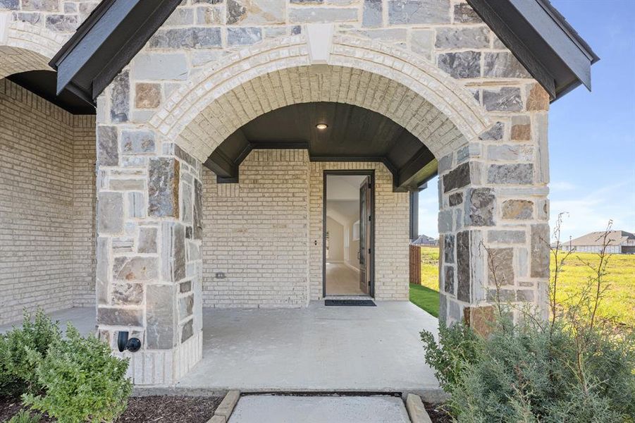 Front exterior of a new home in Sunset Ridge, Alvarado, TX, highlighting curb appeal (Image 22).
