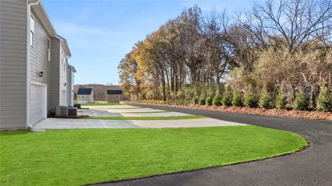 Exterior details and patio area of a home in Brookland Commons, Monroe (Image 21).