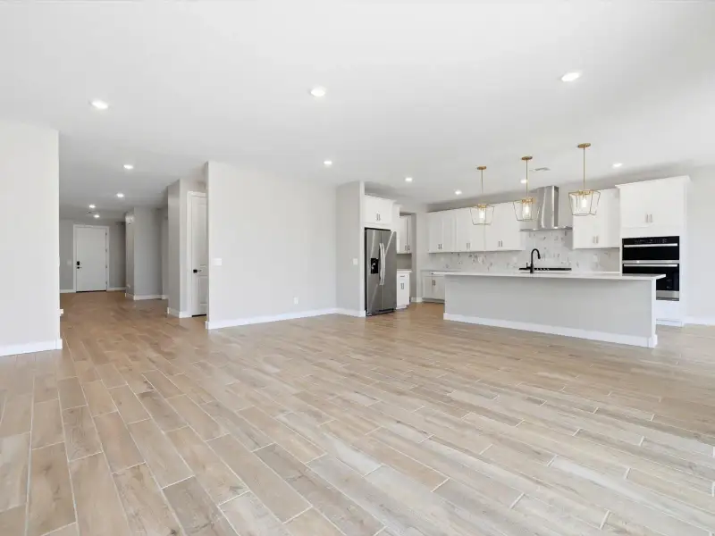 Spacious, unfurnished interior of a new home in White Tank Foothills Signature Series, Waddell (Image 11). Spacious, unfurnished interior of a new home in White Tank Foothills Signature Series, Waddell (Image 11).