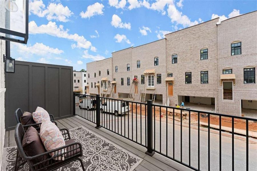 Exterior details and patio area of a home in Skyview On Broad, Sugar Hill (Image 27).