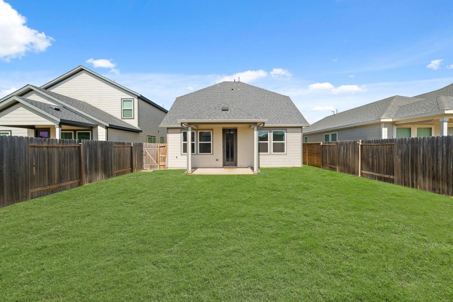 Enjoy the outdoors in this spacious and low-maintenance backyard! With plenty of room for play, gardening, or relaxing, this private outdoor space is the perfect blank canvas to make your own.