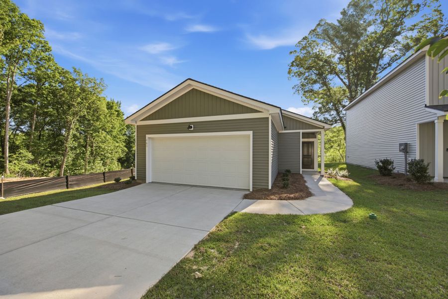 Front exterior of a new home in Grand Arbor, Blythewood, SC, highlighting curb appeal (Image 24).