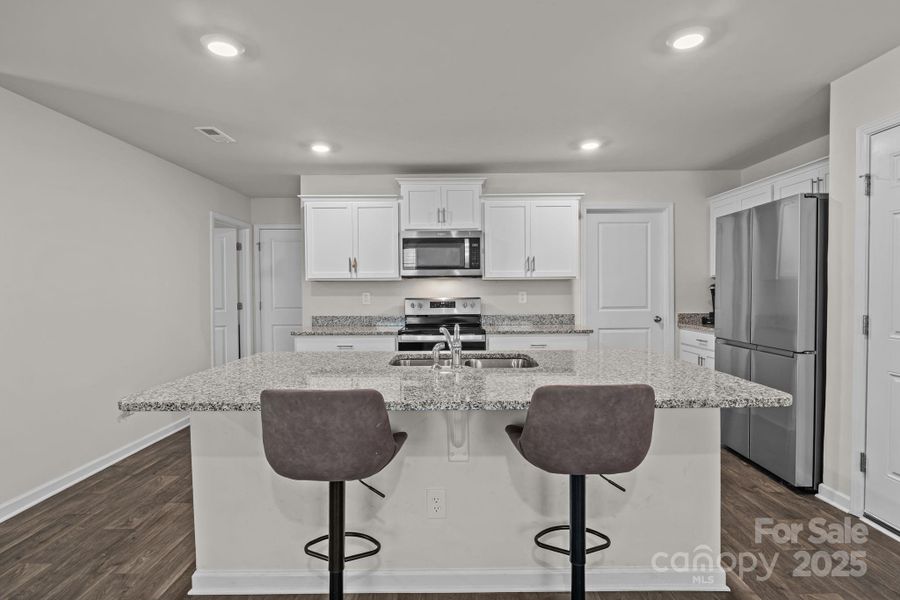 Furnished interior view inside a new home in Mills at Long Creek, Dallas (Image 5).