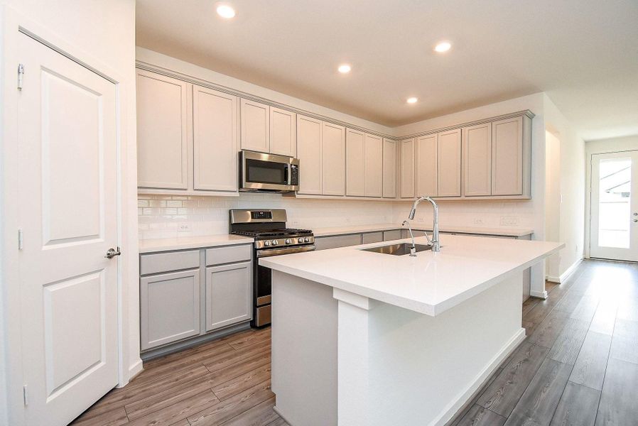 Furnished interior view inside a new home in Mason Woods, Cypress (Image 8).