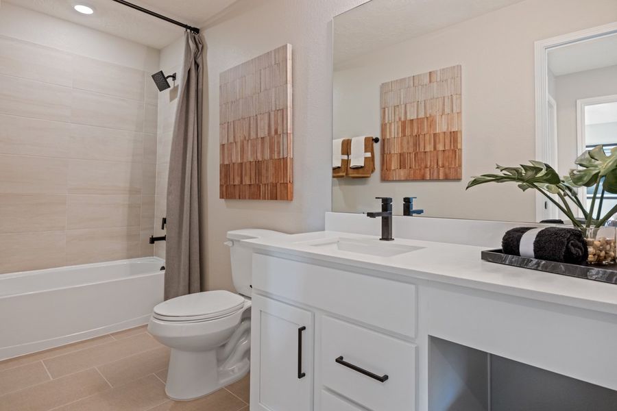 Representative furnished interior of a home built from the 2444 Modeled by KB Home in Madera Preserve, New Caney (Image 18).