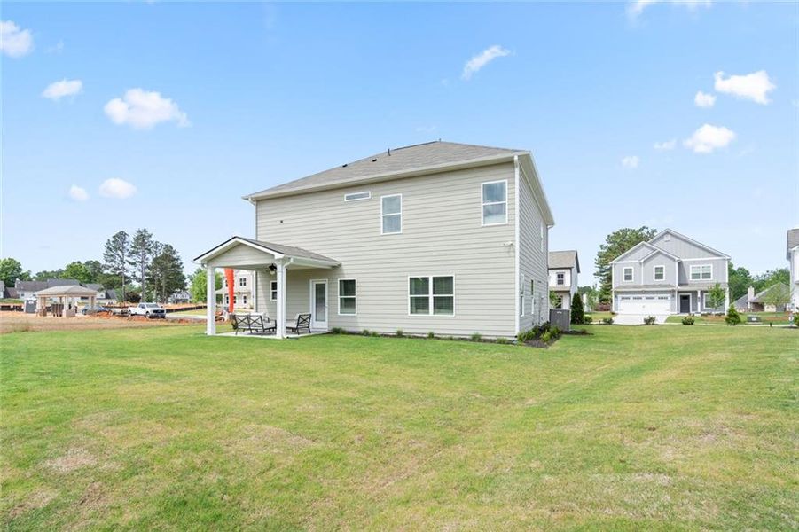 Exterior details and patio area of a home in Morgan Landing, Carrollton (Image 3).