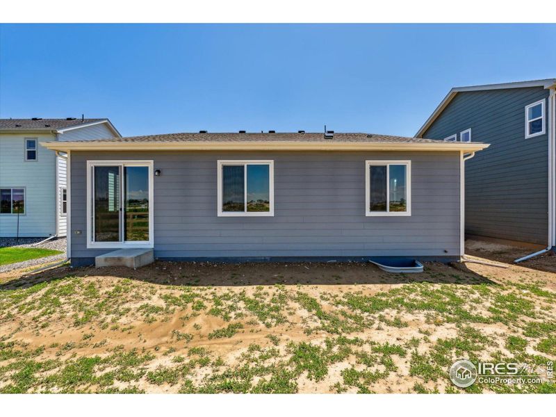 Front exterior of a new home in Prairie Song, Windsor, CO, highlighting curb appeal (Image 17).