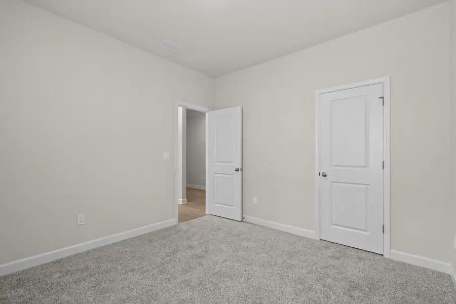 Spacious, unfurnished interior of a new home in Waterside - Coastline Series, Longs (Image 29). Spacious, unfurnished interior of a new home in Waterside - Coastline Series, Longs (Image 29).