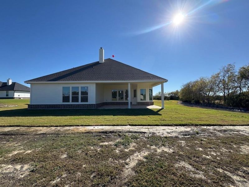 Exterior details and patio area of a home in Nash Estates, Tom Bean (Image 3). Exterior details and patio area of a home in Nash Estates, Tom Bean (Image 3).