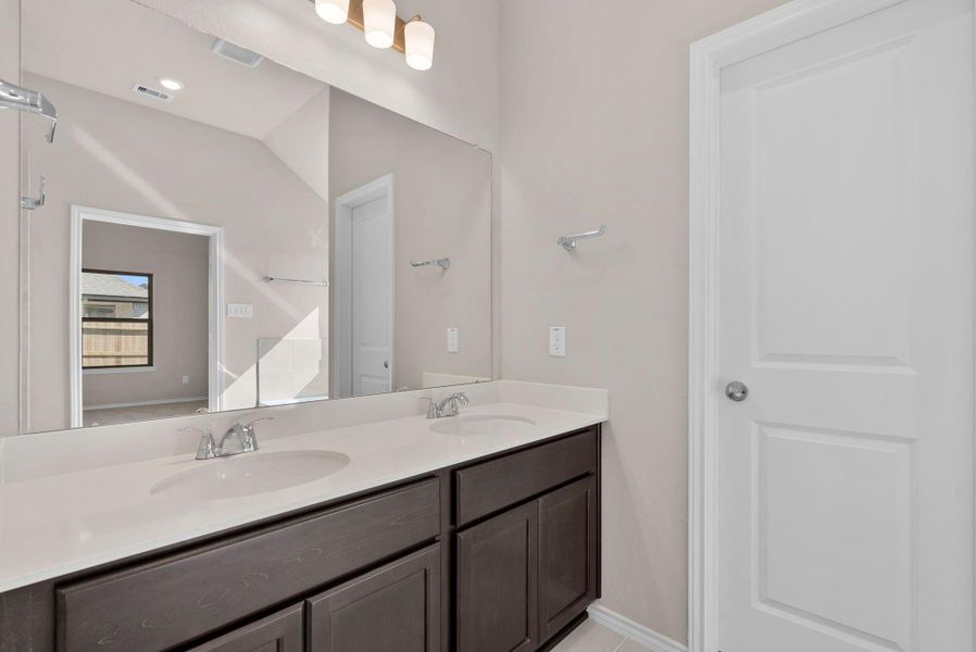 Furnished interior view inside a new home in The Trails 40', New Caney (Image 8).