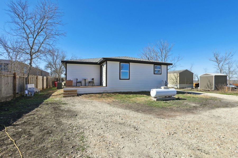 Exterior details and patio area of a home in , Dale (Image 23).