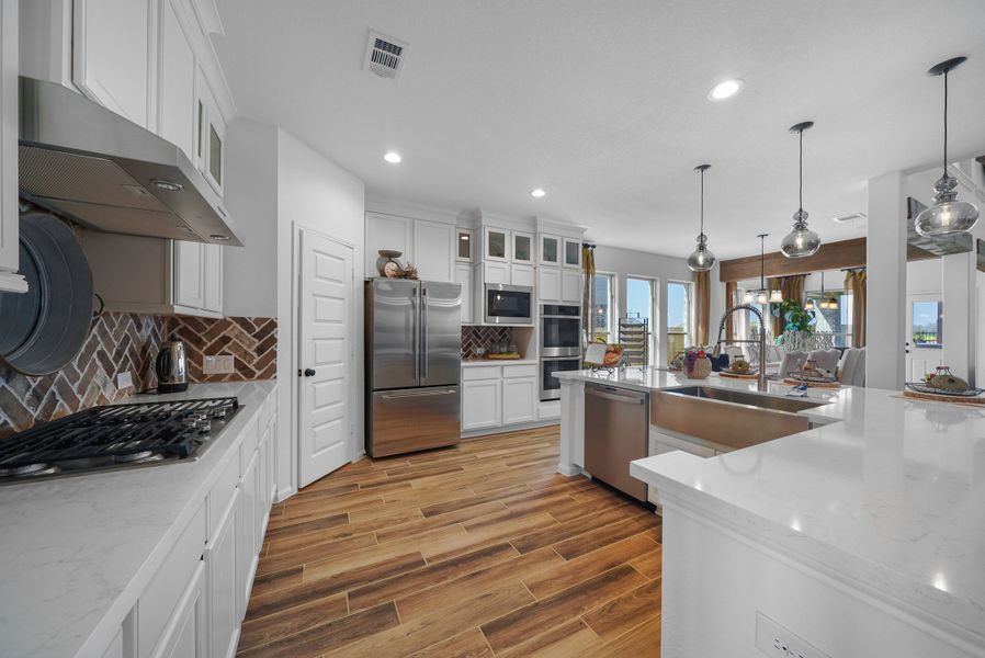 Kitchen with island and pendant lighting