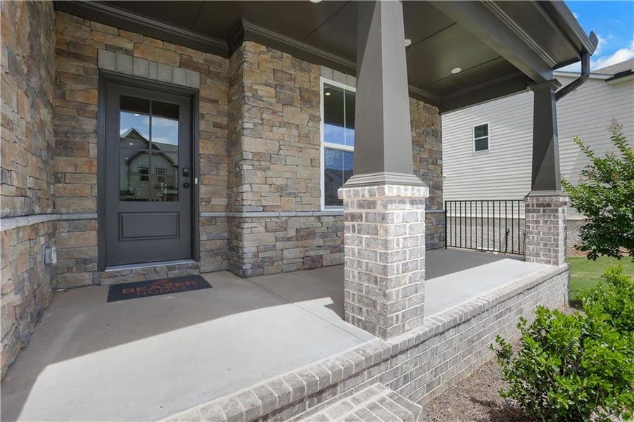 Exterior details and patio area of a home in The Paddocks at Doc Hughes, Buford (Image 3). Exterior details and patio area of a home in The Paddocks at Doc Hughes, Buford (Image 3).