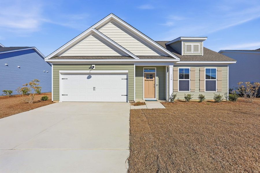 View of front facade with a shingled roof, concrete driveway, and an attached garage View of front facade with a shingled roof, concrete driveway, and an attached garage