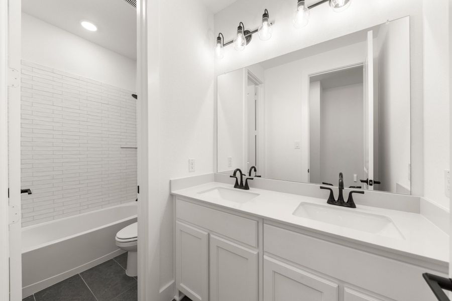 Furnished interior view inside a new home in Inspiration Collection at Union Park, Little Elm (Image 12).