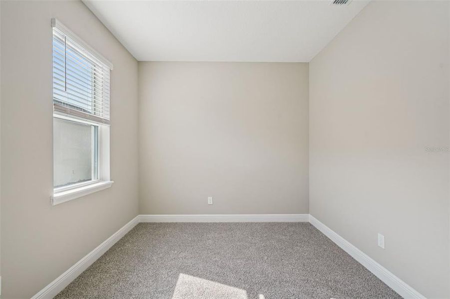 Spacious, unfurnished interior of a new home in Legends Preserve - Signature Series, Daytona Beach (Image 27). Spacious, unfurnished interior of a new home in Legends Preserve - Signature Series, Daytona Beach (Image 27).