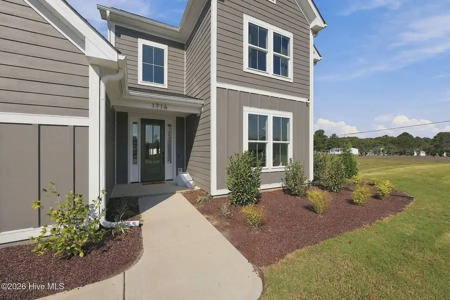 Exterior details and patio area of a home in Dixon Grove, Grimesland (Image 3).