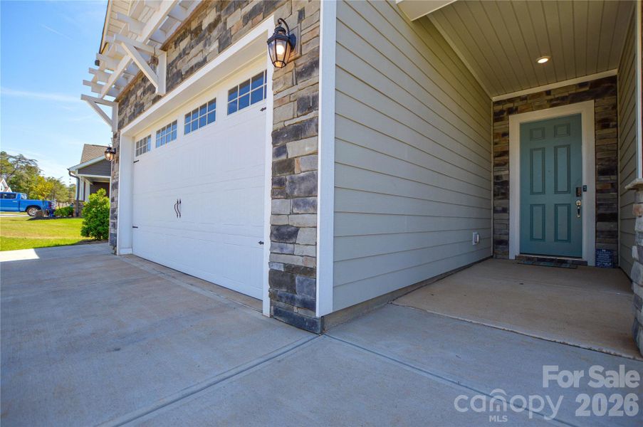 Exterior details and patio area of a home in Edgewater Lakeview On Your Lot, Lancaster (Image 28).