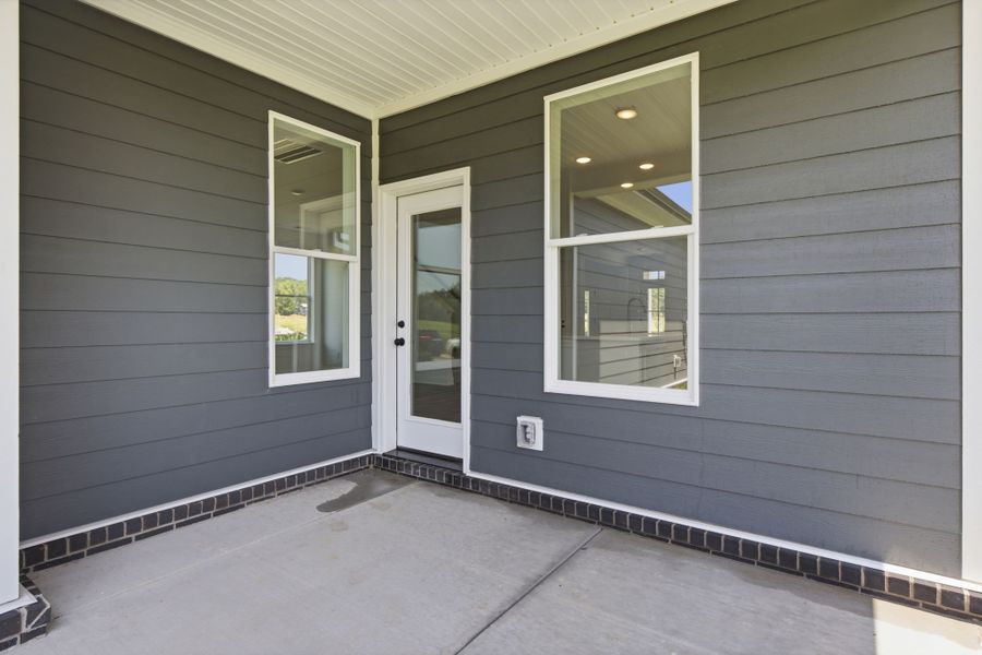 Exterior details and patio area of a home in Heritage Green – The Classic Collection, Columbia (Image 4).
