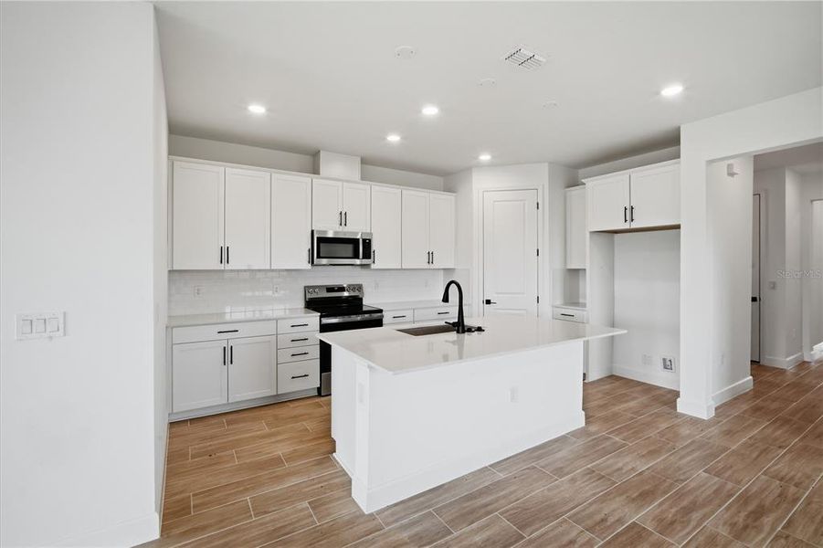 Furnished interior view inside a new home in Glen Lakes, Weeki Wachee (Image 9). Furnished interior view inside a new home in Glen Lakes, Weeki Wachee (Image 9).