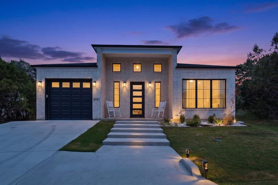 Front exterior of a new home in , Granbury, TX, highlighting curb appeal (Image 23).