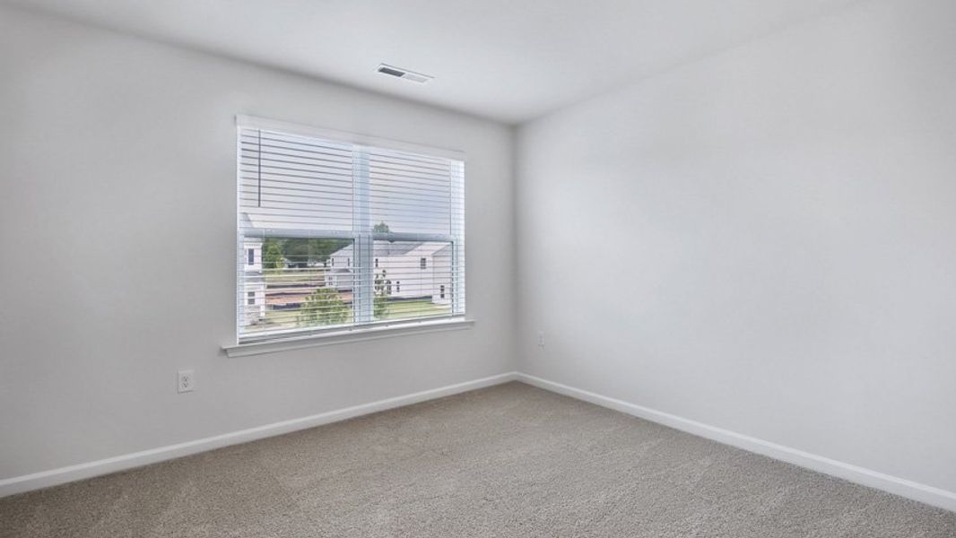 Spacious, unfurnished interior of a new home in Wilson's Ridge, Wilson's Mills (Image 21).