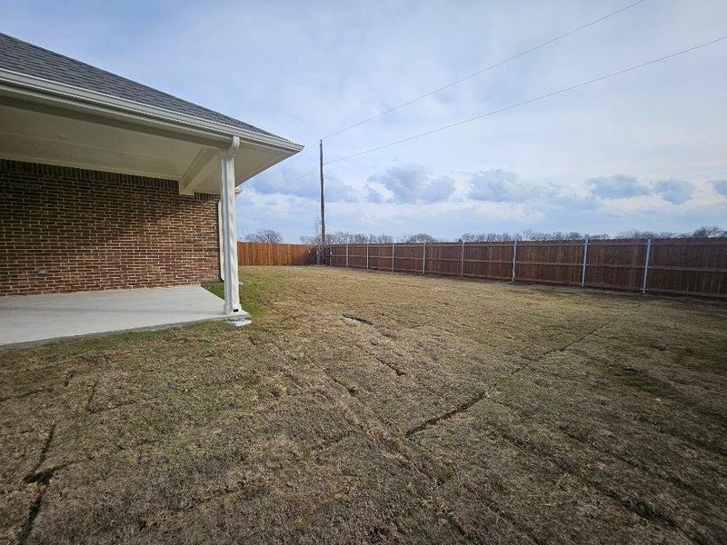 Exterior details and patio area of a home in Aero Vista, Caddo Mills (Image 6).