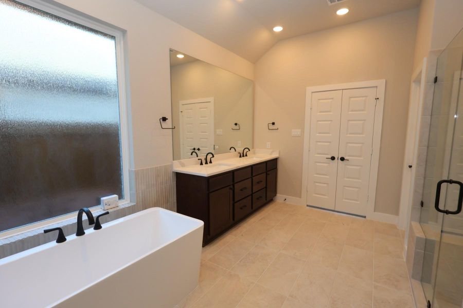 Furnished interior view inside a new home in Woodson’s Reserve, Spring (Image 7).