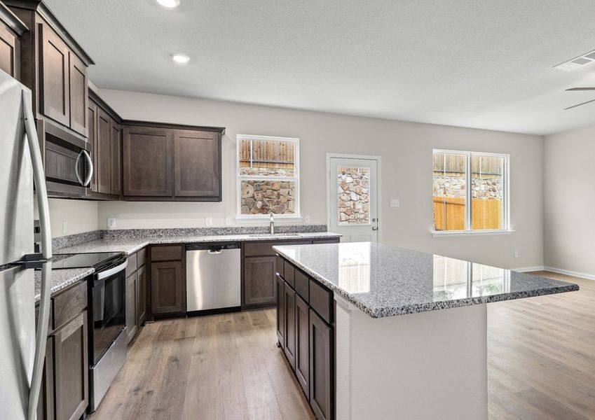 The kitchen has energy-efficient appliances.