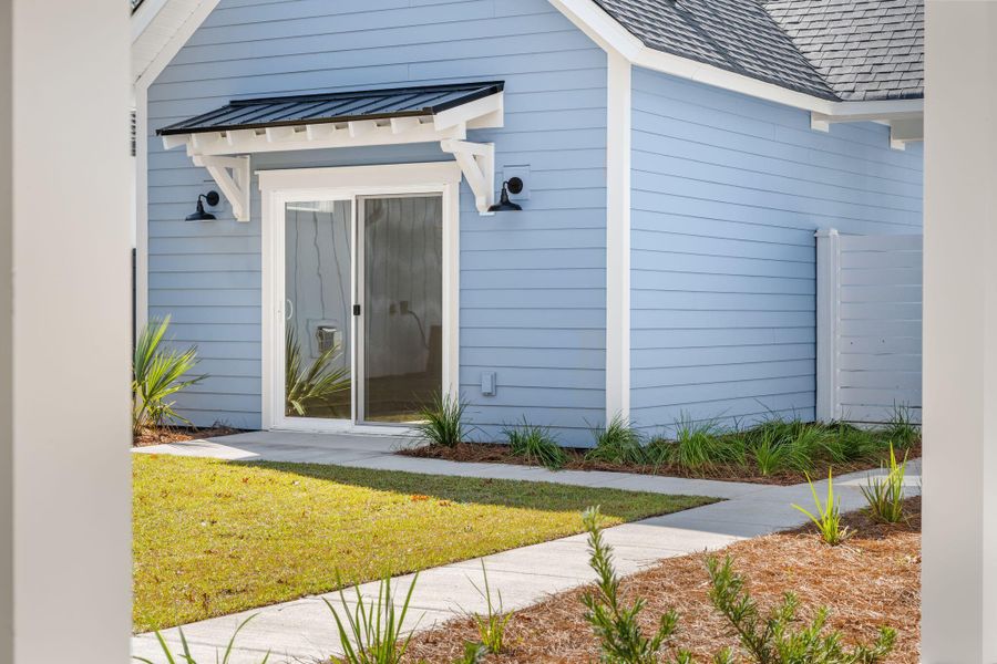 Exterior details and patio area of a home in The Domus Collection at Midtown Nexton, Summerville (Image 29).