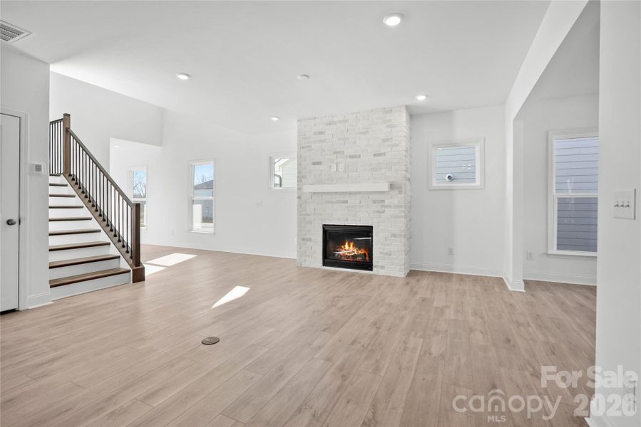 Gas fireplace at gathering room with brick surround