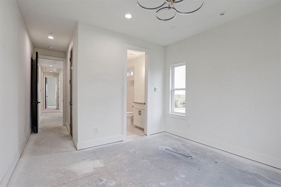 Bedroom featuring connected bathroom