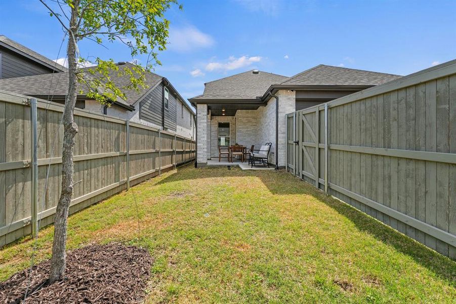 Exterior details and patio area of a home in Pecan Square, Northlake (Image 23). Exterior details and patio area of a home in Pecan Square, Northlake (Image 23).