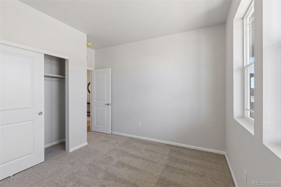 Spacious, unfurnished interior of a new home in The Legacy Collection at Talon Pointe, Thornton (Image 20).