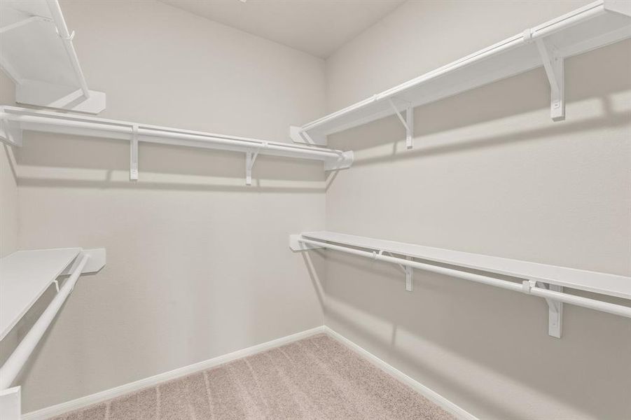 A view of your large primary walk-in Closet