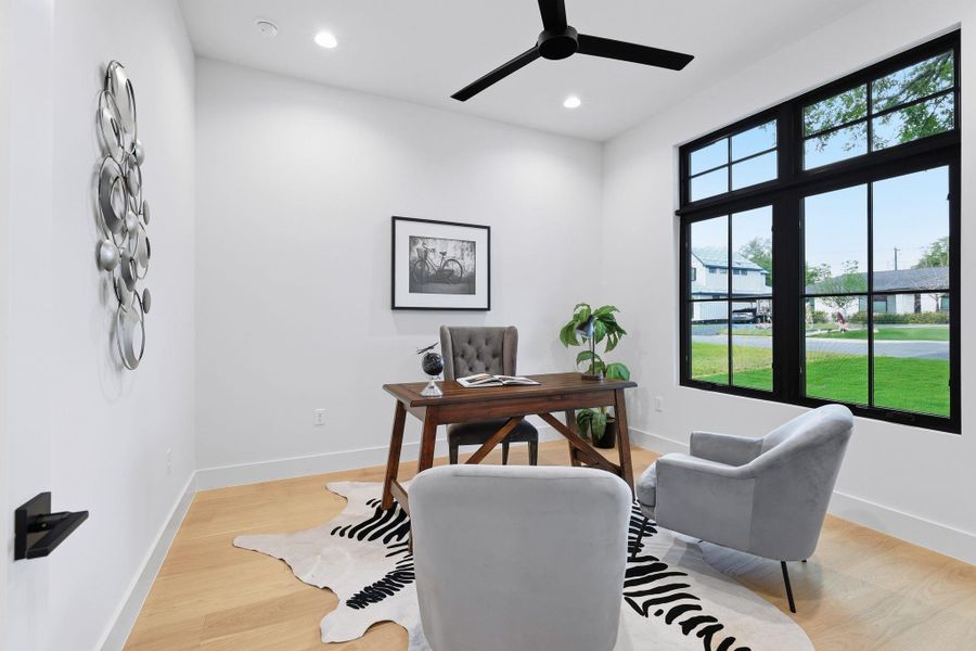 Office area featuring light wood-type flooring, recessed lighting, and ceiling fan