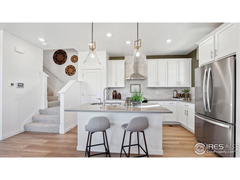 Furnished interior view inside a new home in Villas at Vantage, Berthoud (Image 17).