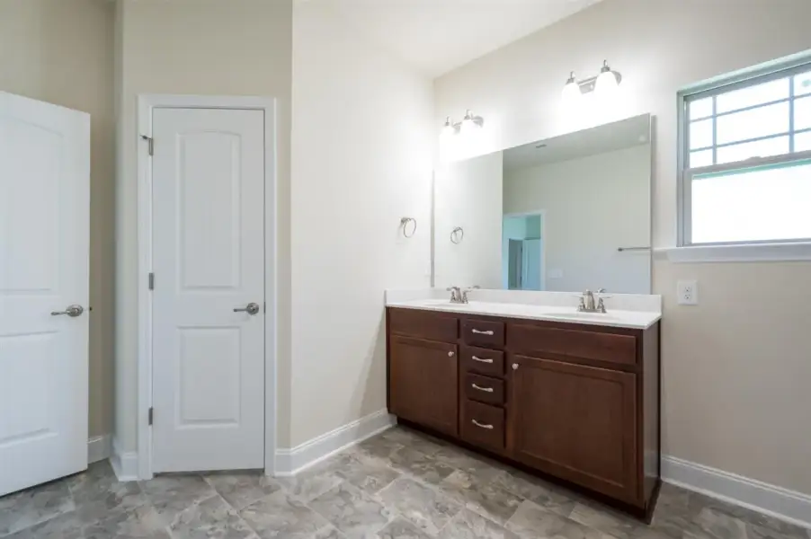 Representative furnished interior of a home built from the 1602-2 by Adams Homes in Ham Farm, La Grange (Image 9).
