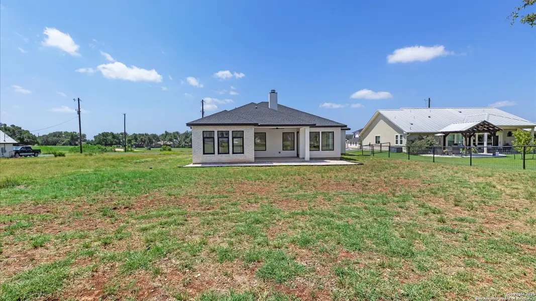 Exterior details and patio area of a home in , Blanco (Image 4).