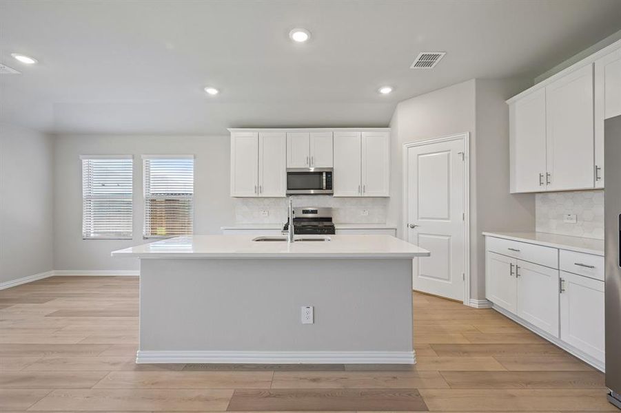 Furnished interior view inside a new home in Parks at Foster Crossing - Signature Series, Anna (Image 7). Furnished interior view inside a new home in Parks at Foster Crossing - Signature Series, Anna (Image 7).