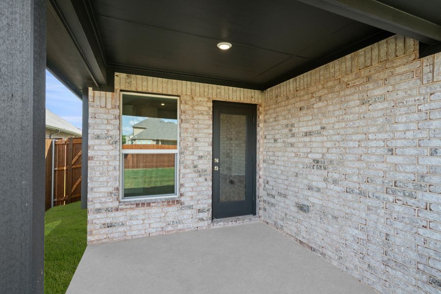 Exterior details and patio area of a home in El Dorado, Granbury (Image 3). Exterior details and patio area of a home in El Dorado, Granbury (Image 3).