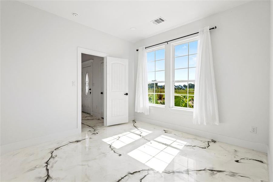 Spare room featuring baseboards Spare room featuring baseboards