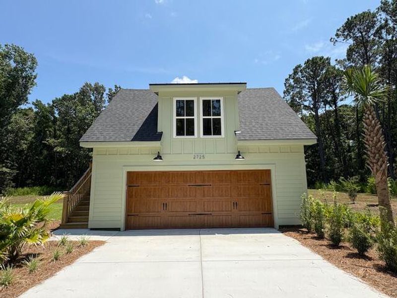Front exterior of a new home in , Johns Island, SC, highlighting curb appeal (Image 23).