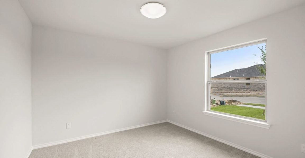 Representative exterior photo of a completed home built from the Boston by Impression Homes in Baker Farms, Cleburne, TX (Image 14).