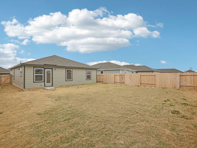Exterior details and patio area of a home in Eastern Wells, Jarrell (Image 2). Exterior details and patio area of a home in Eastern Wells, Jarrell (Image 2).