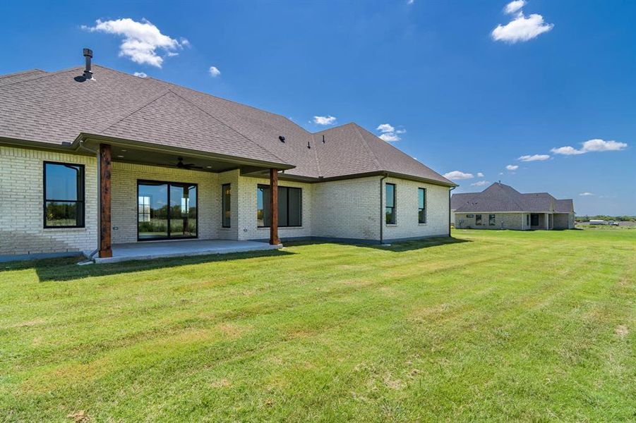Front exterior of a new home in , Caddo Mills, TX, highlighting curb appeal (Image 2). Front exterior of a new home in , Caddo Mills, TX, highlighting curb appeal (Image 2).