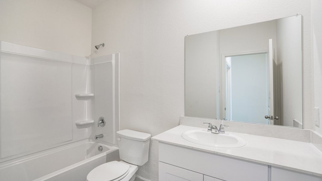 Representative furnished interior of a home built from the Athena by Starlight Homes in Stonebrooke, Conroe (Image 12).