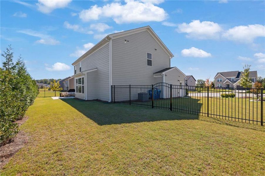 Exterior details and patio area of a home in Sweetbay Farm, Lawrenceville (Image 26).